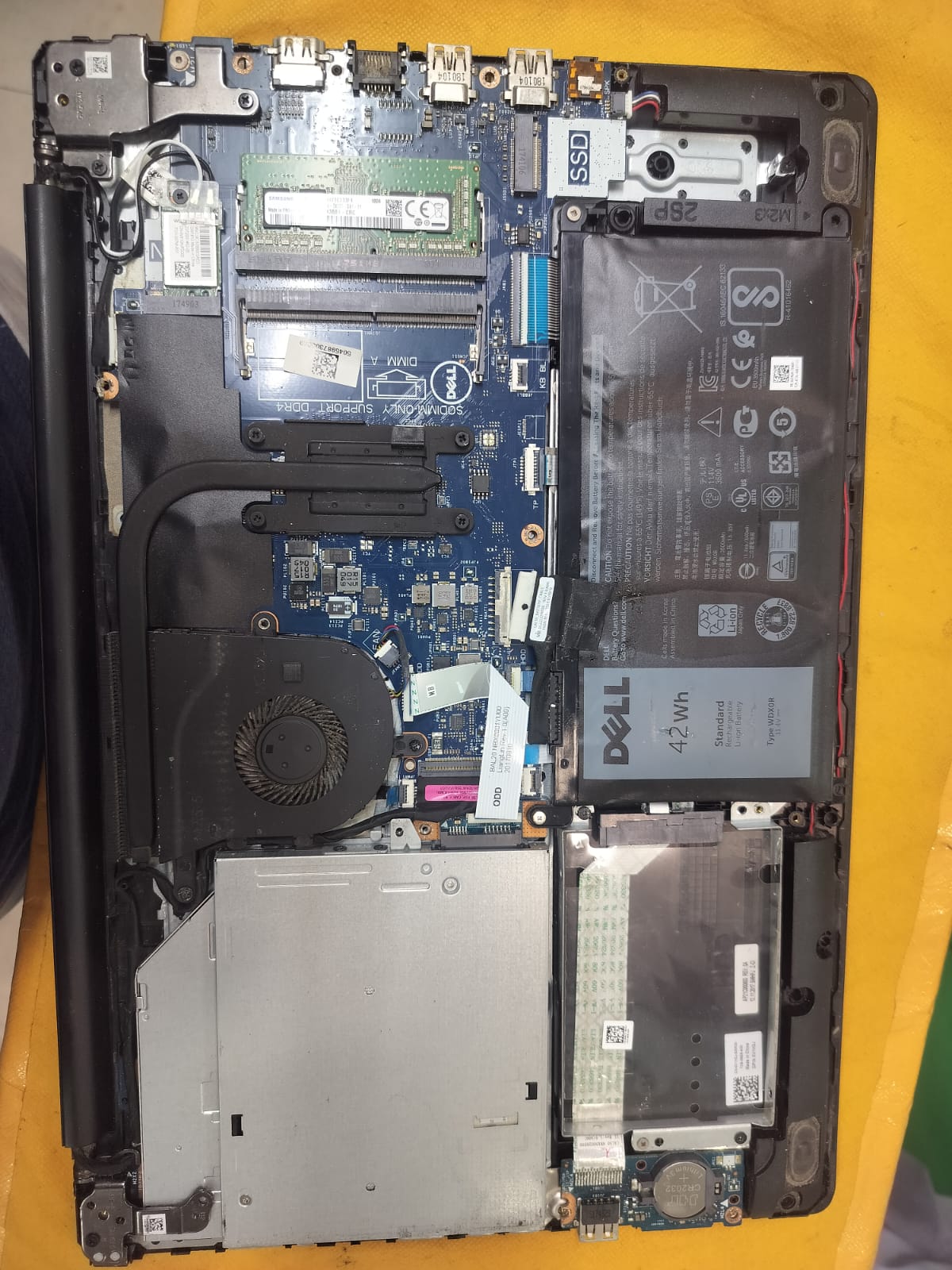 Dell laptop opened for internal diagnosis and parts inspection